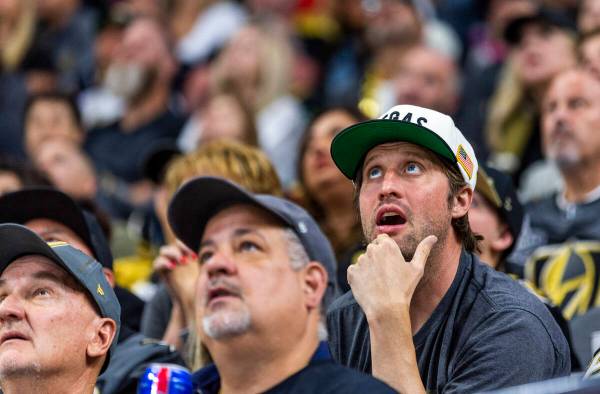 Golden Knights fans react to a fourth goal by the Dallas Stars in the third period of Game 5 du ...