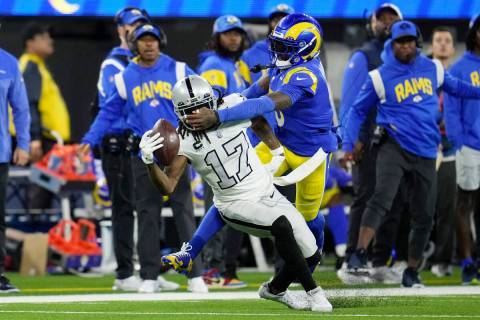 Las Vegas Raiders wide receiver Davante Adams (17) makes a one-handed catch as Los Angeles Rams ...