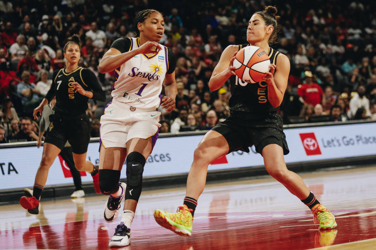 Aces guard Kelsey Plum (10) drives the ball to the hoop in a game against the Los Angeles Spark ...
