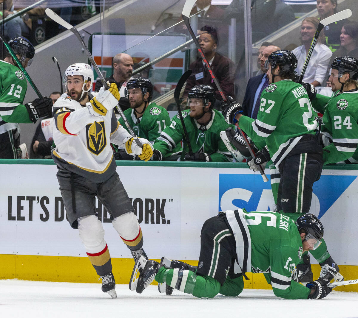 Golden Knights center Nicolas Roy (10) skates away after a big shot on Dallas Stars center Joe ...