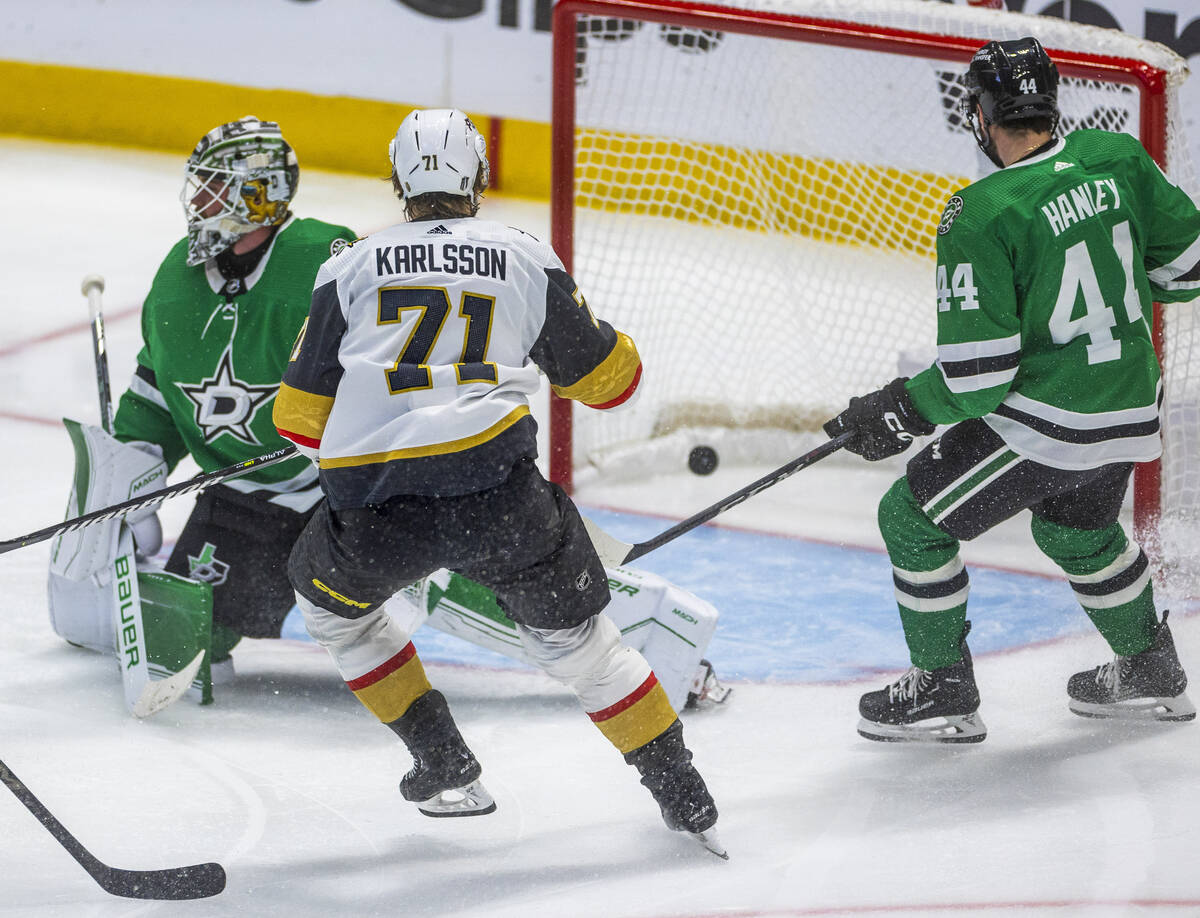 Golden Knights center William Karlsson (71) watches the puck enter the net on Dallas Stars goal ...