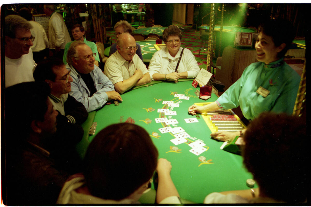 Christine Toly dealing "face-up" blackjack to tourists at the Tropicana Hotel's "Learning 21" t ...