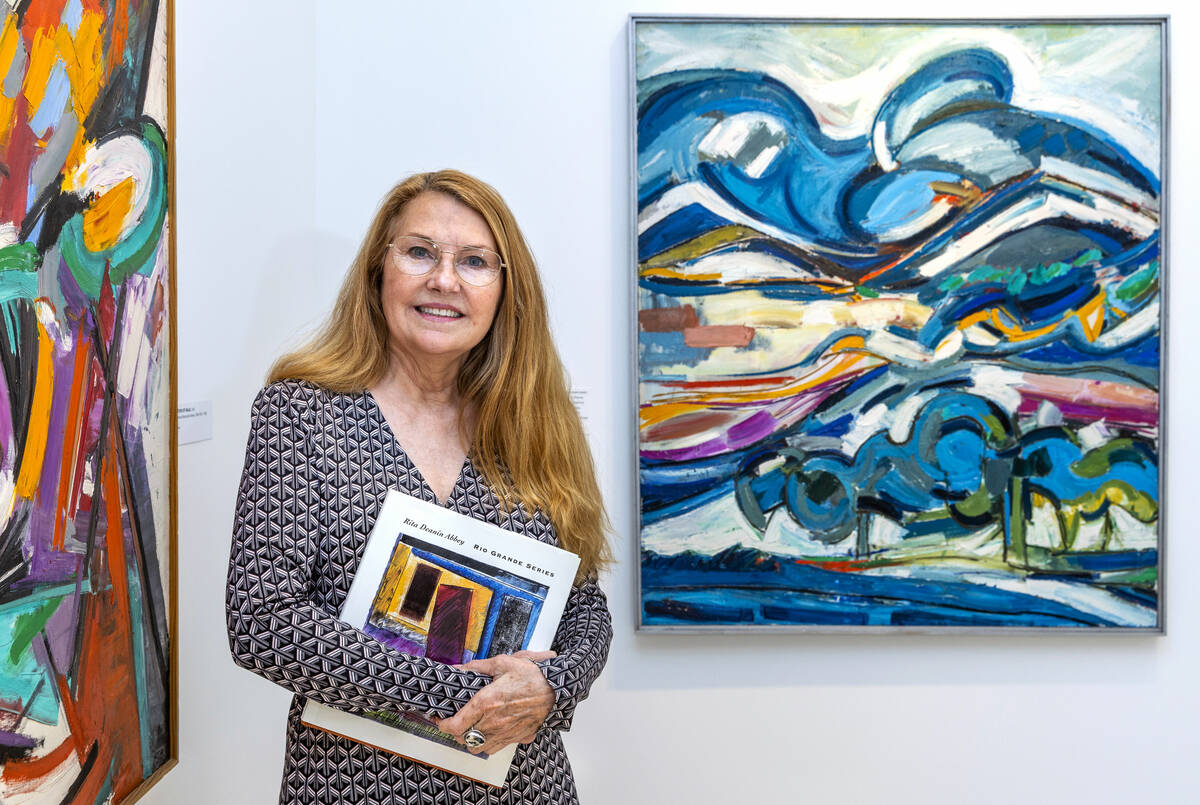 Museum Executive Director Laura Sanders with Rita Deanin Abbey's "Perception of Baja" 1957, as ...