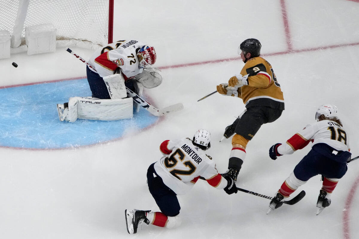 Vegas Golden Knights center Jack Eichel (9) scores on Florida Panthers goaltender Sergei Bobrov ...