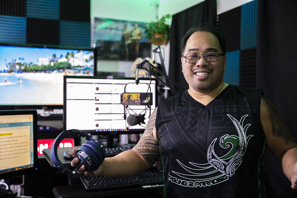 Paul Pu'ukani Sebala in his home radio studio, which is full of native Hawaiian paraphernalia a ...