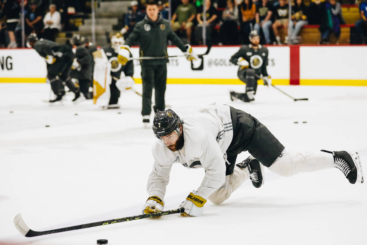 Golden Knights defenseman Alex Pietrangelo dives to catch a puck during practice on Friday, Jun ...