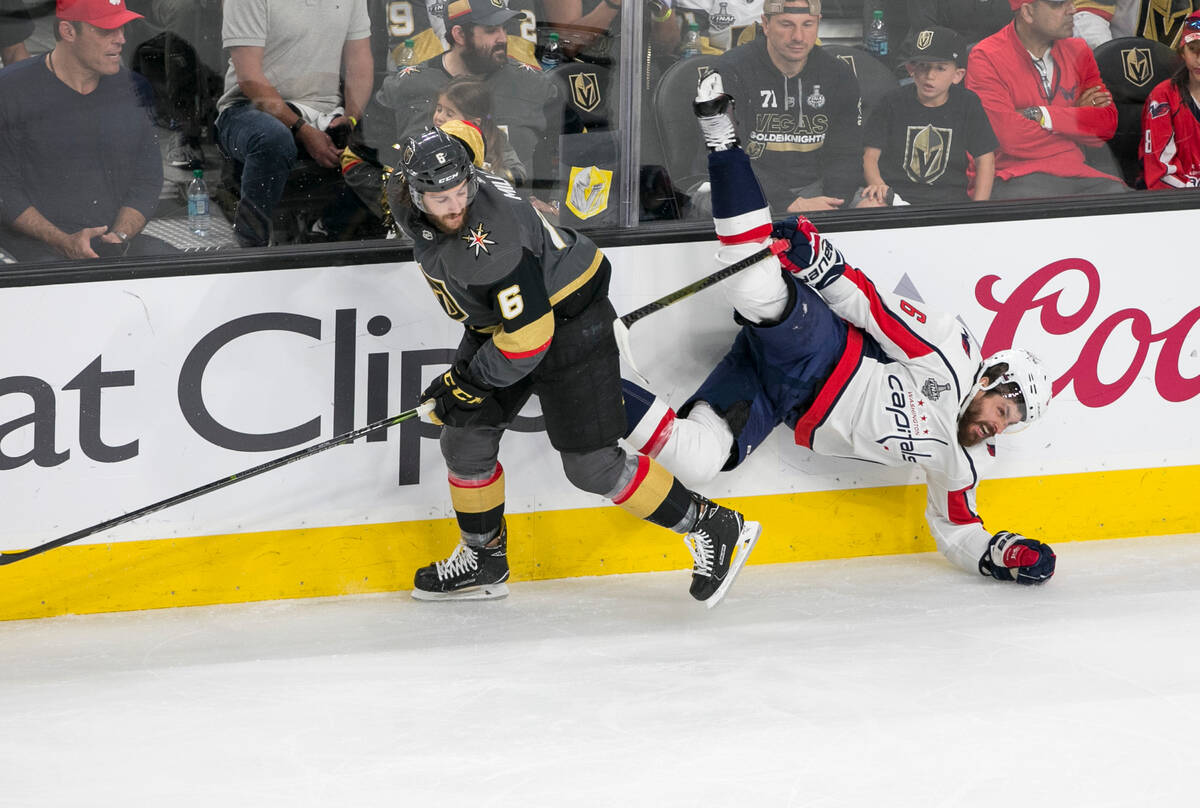 Vegas Golden Knights defenseman Colin Miller (6) skates away after colliding with Washington Ca ...