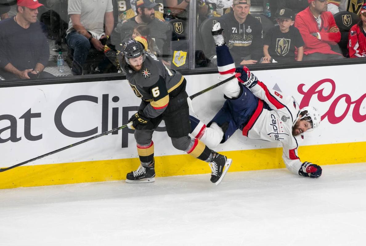 Vegas Golden Knights defenseman Colin Miller (6) skates away after colliding with Washington Ca ...