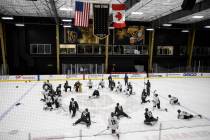 The Golden Knights stretch during training camp practice at City National Arena on Friday, Oct. ...
