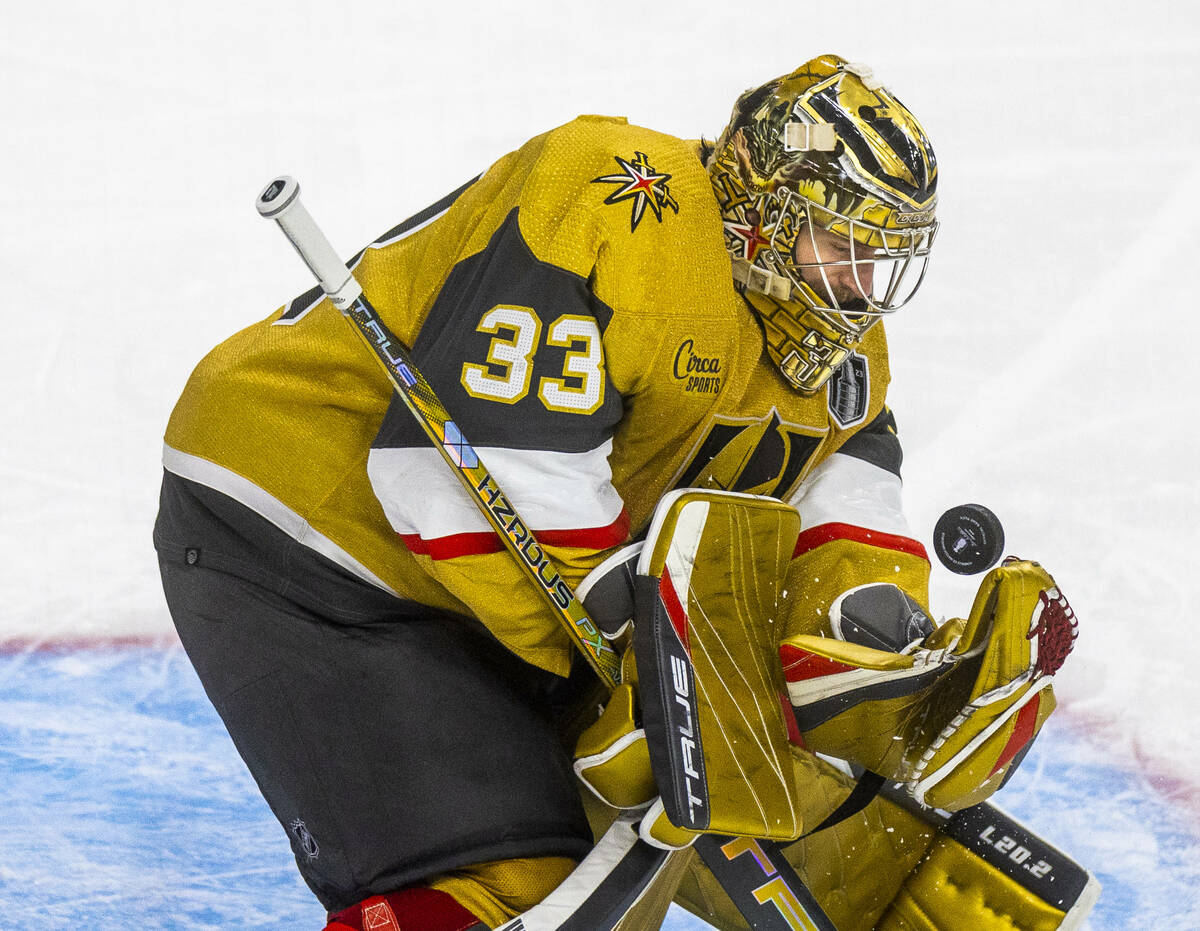 Golden Knights goaltender Adin Hill (33) fields a shot on goal by the Florida Panthers during t ...