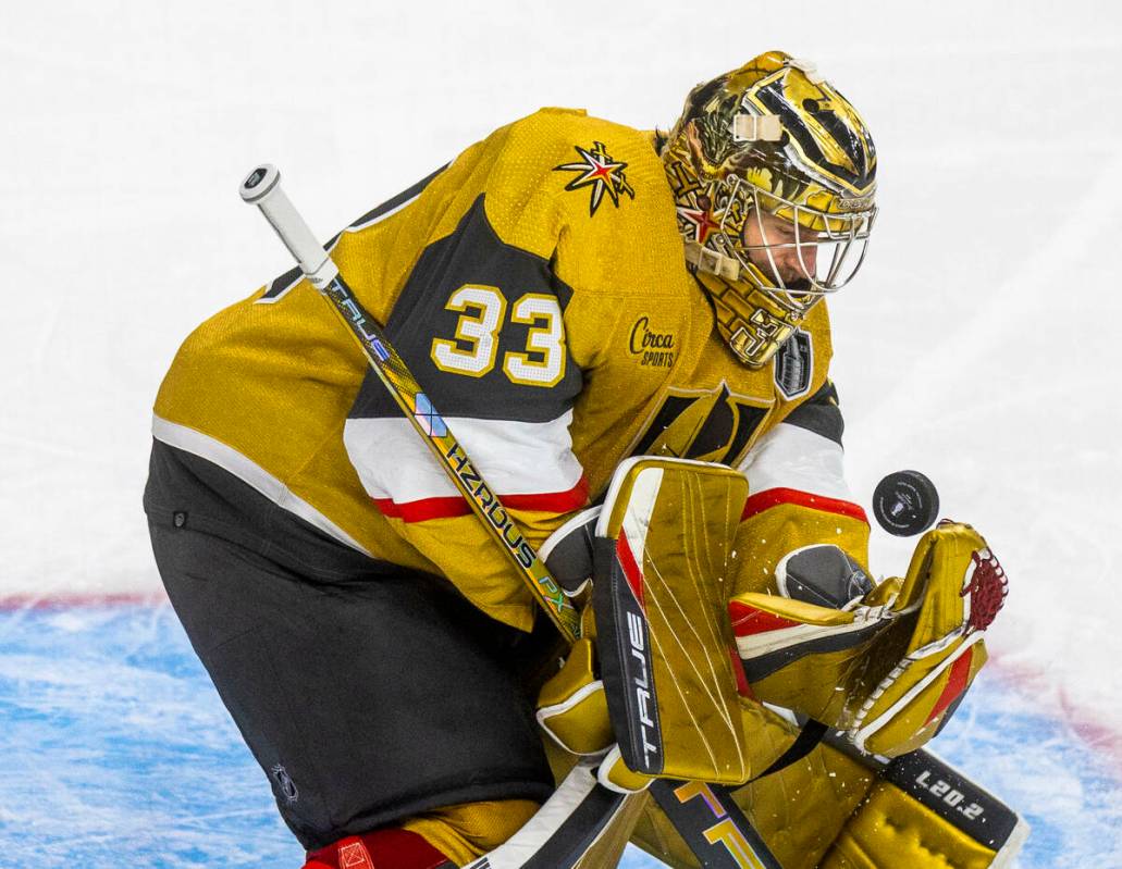 Golden Knights goaltender Adin Hill (33) fields a shot on goal by the Florida Panthers during t ...