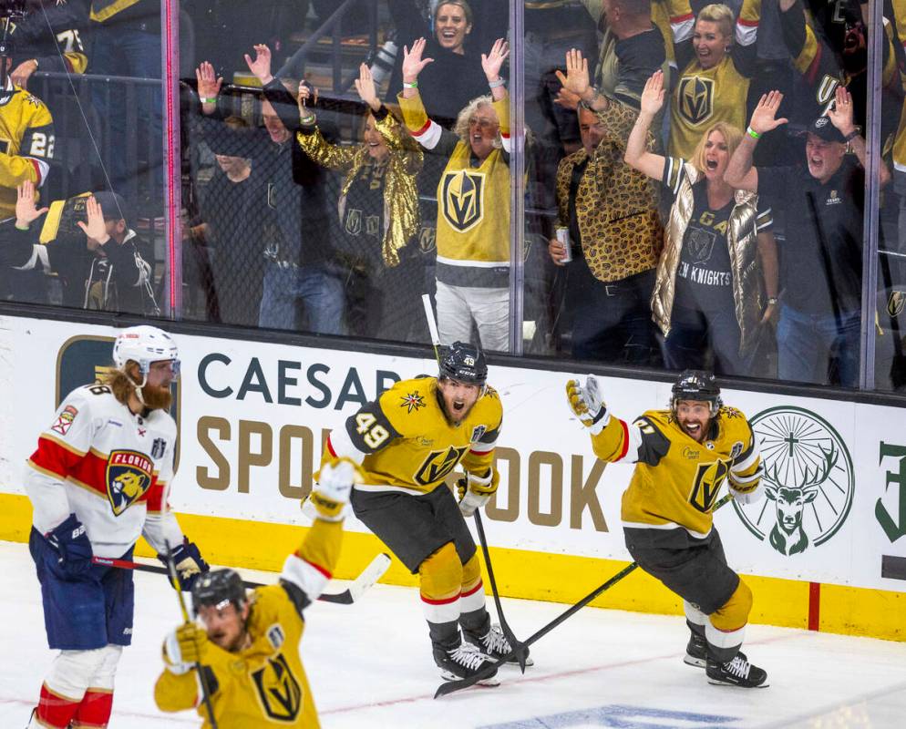 Golden Knights center Ivan Barbashev (49) and right wing Jonathan Marchessault (81) celebrate a ...