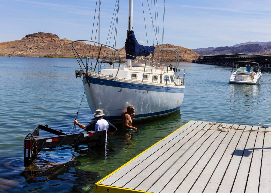 People prepare to take their boats out of the water at the Las Vegas Boat Harbor in the Lake Me ...