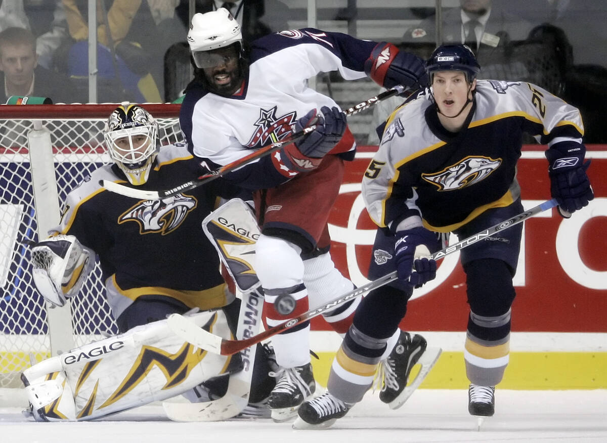 FILE - In this Jan. 12, 2007, file photo, Nashville Predators center Jerred Smithson (25) clear ...