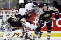 FILE - In this Jan. 12, 2007, file photo, Nashville Predators center Jerred Smithson (25) clear ...