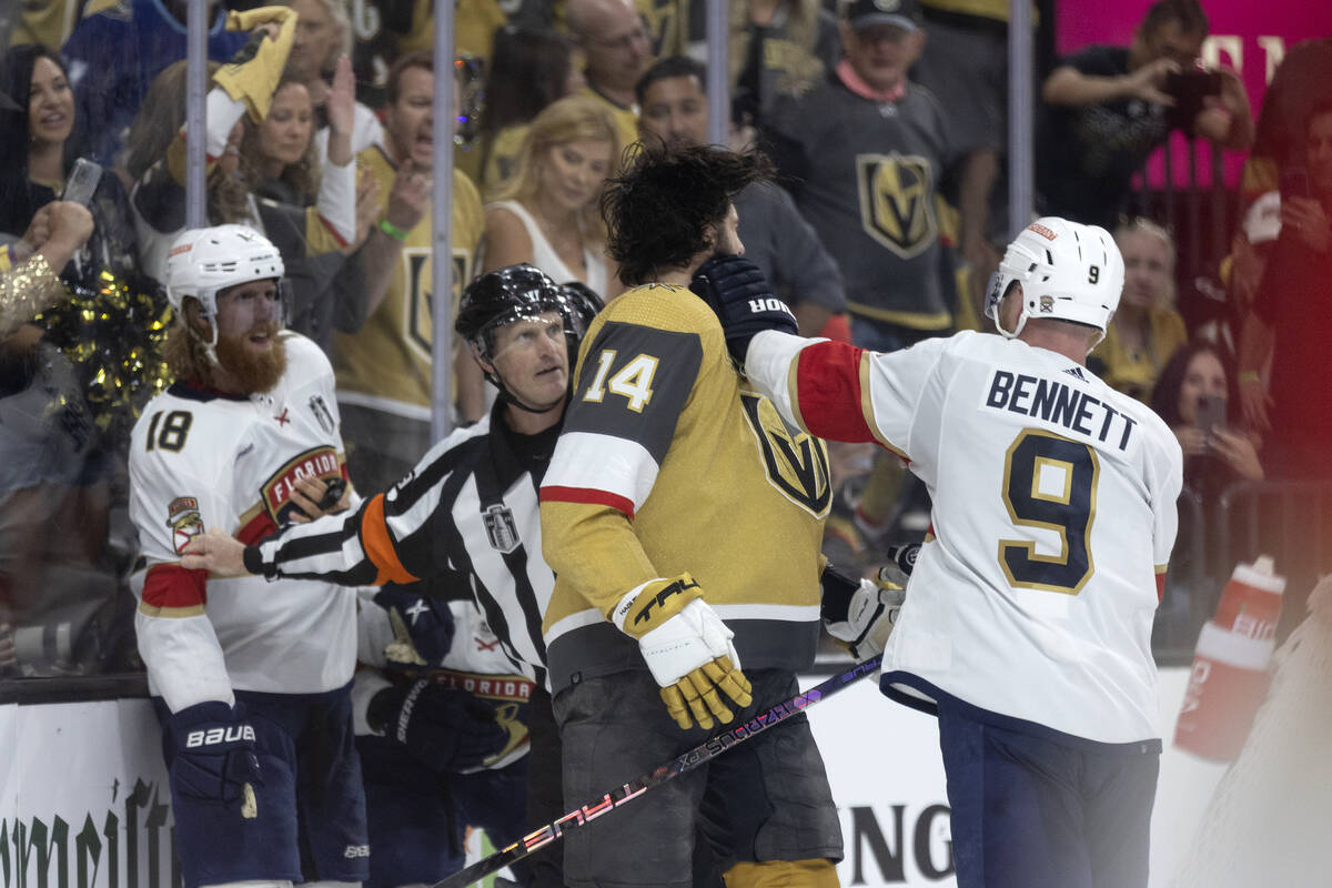 Florida Panthers center Sam Bennett (9) punches Golden Knights defenseman Nicolas Hague (14) wh ...