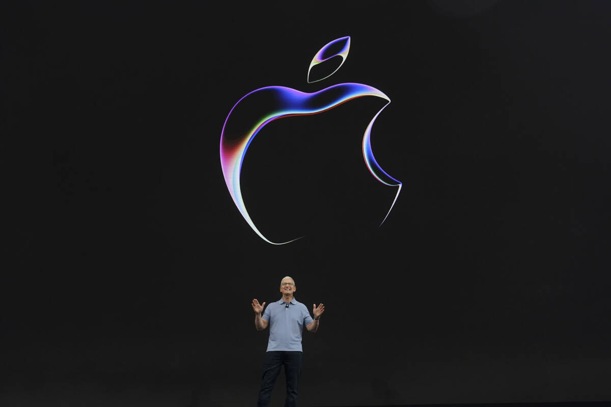 Apple CEO Tim Cook speaks during an annoucement of new products on the Apple campus Monday, Jun ...