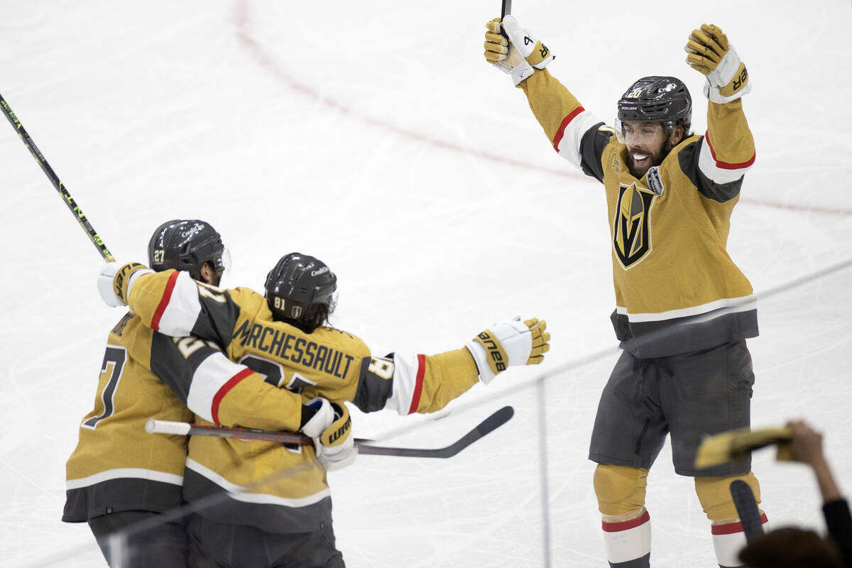 Golden Knights defenseman Shea Theodore (27), right wing Jonathan Marchessault (81) and center ...