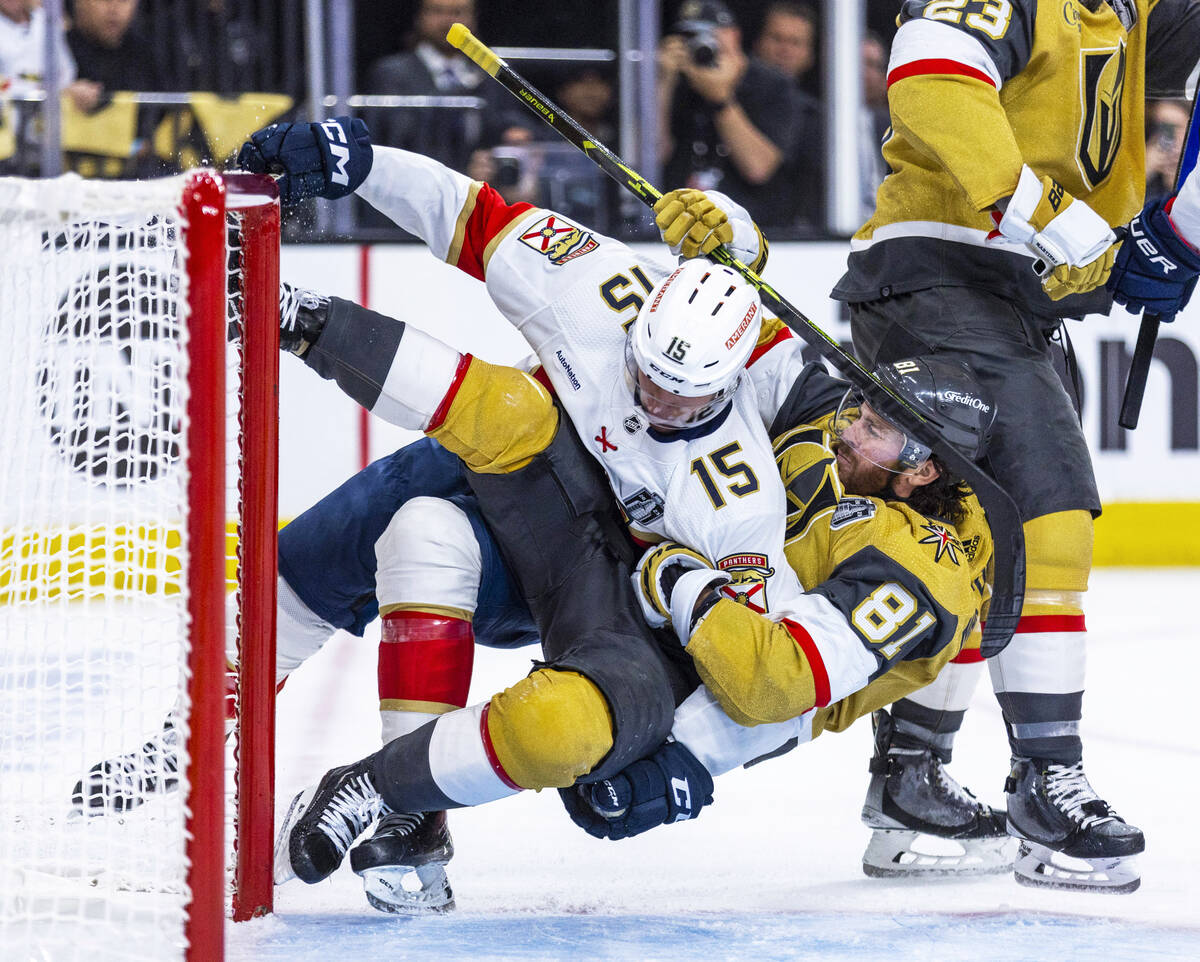 Florida Panthers center Anton Lundell (15) is taken down during a fight with Golden Knights rig ...