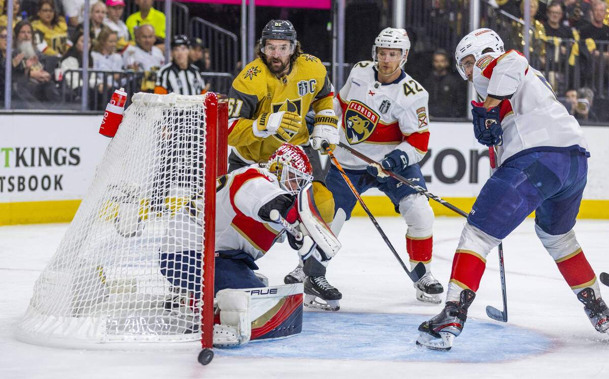 Golden Knights right wing Mark Stone (61) watches a puck get deflected by Florida Panthers goal ...