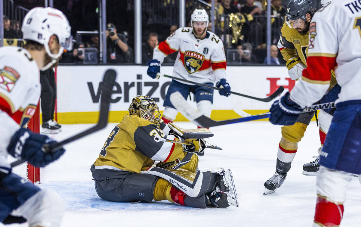 Golden Knights goaltender Adin Hill (33) makes a stop while seated on the ice against the Flori ...