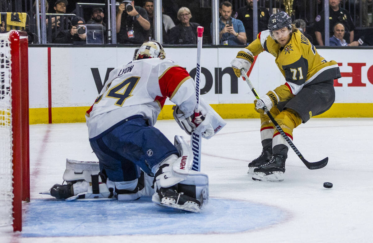 Golden Knights center William Karlsson (71) sets up another score against Florida Panthers goal ...