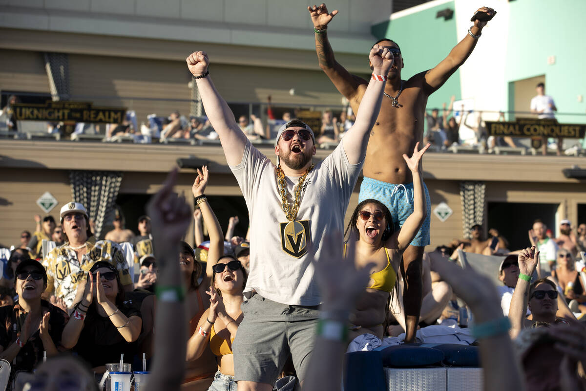 Golden Knights fans cheer for their team during Game 3 of the Stanley Cup Final between the Kni ...