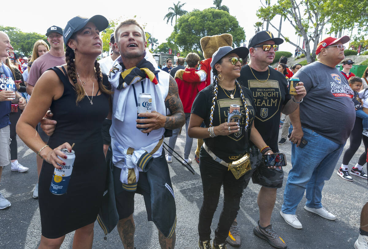 Golden Knights fans, from left, Rachel Boivin and Billy Laberge of Quebec, Canada, with Jessie ...