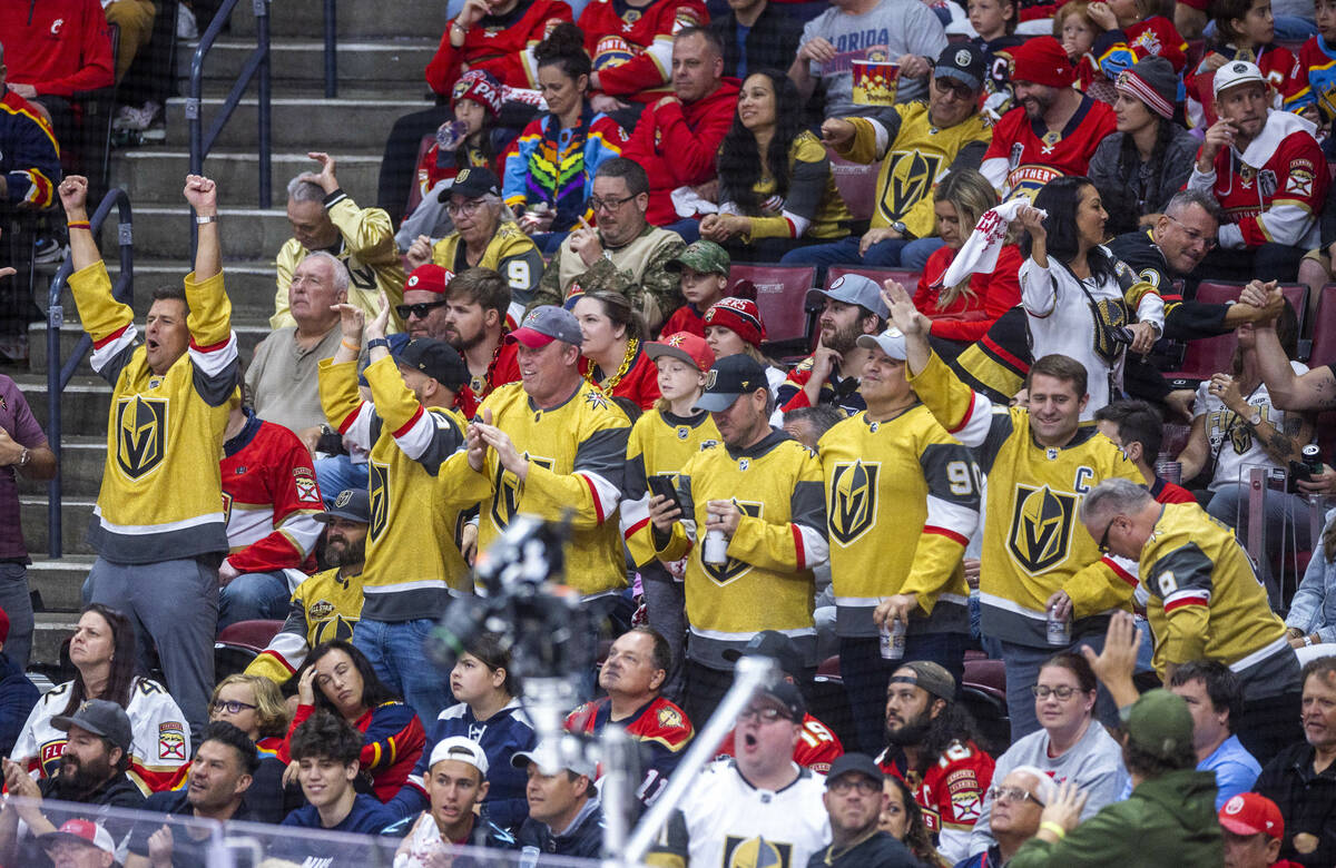 Golden Knights fans celebrate a goal against the Florida Panthers in the first period during Ga ...