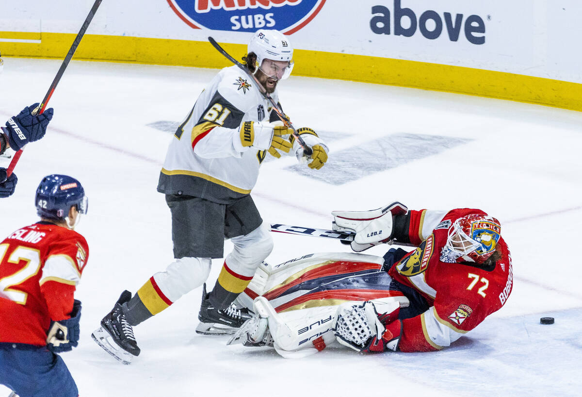 Golden Knights right wing Mark Stone (61) celebrates a score on Florida Panthers goaltender Ser ...