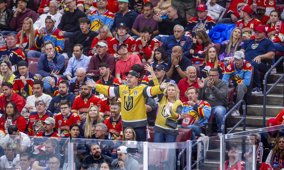 Golden Knights fans celebrate a score against the Florida Panthers in the second period during ...