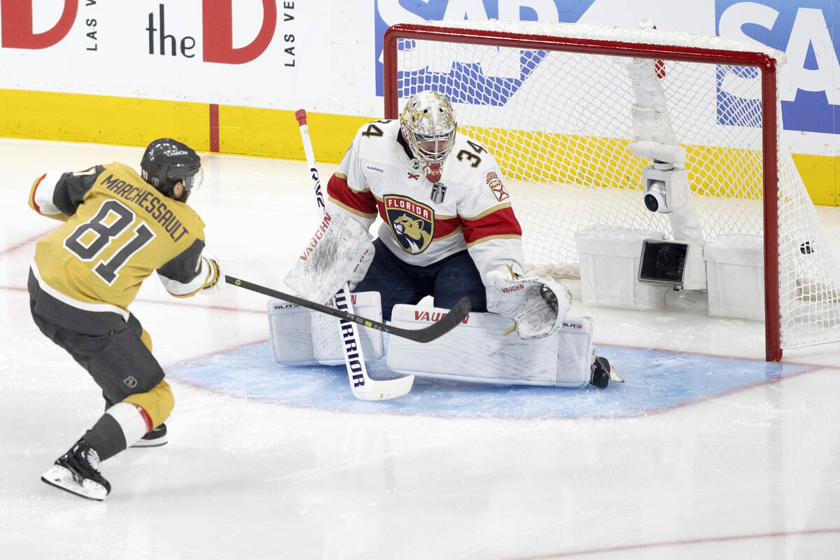 Golden Knights right wing Jonathan Marchessault (81) scores on Florida Panthers goaltender Alex ...