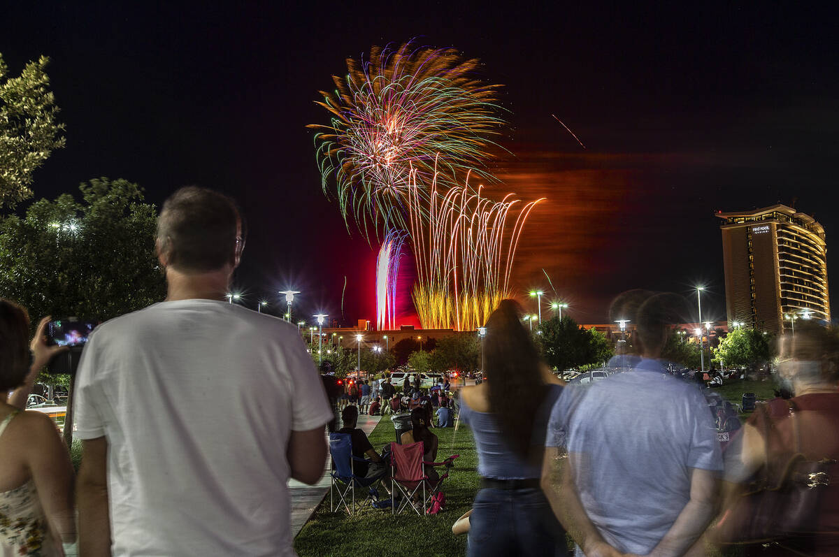 People watch the Red Rock Casino fireworks show from Downtown Summerlin on Saturday, July 4, 2 ...