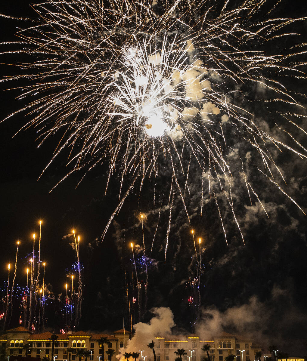 Fireworks go off above the Green Valley Ranch, on Sunday, July 4, 2021, in Henderson. (Bizuayeh ...