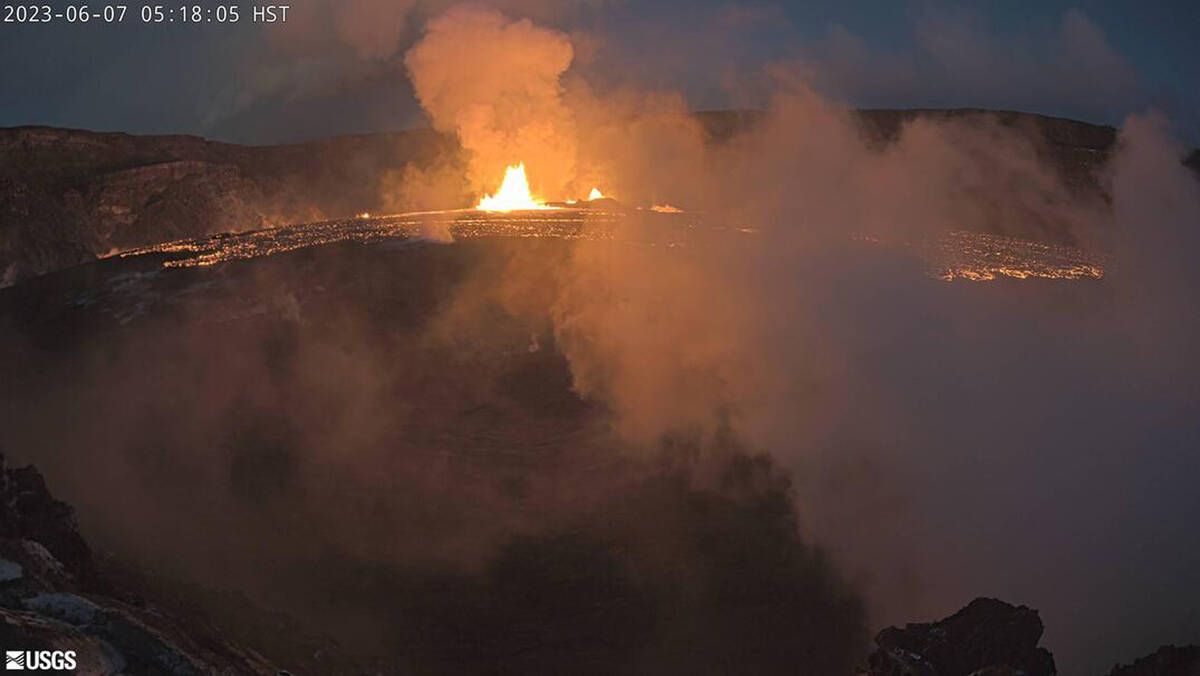 In this webcam image provided by the U.S. Geological Survey, an eruption takes place on the sum ...