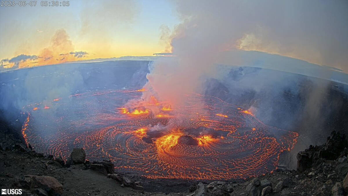 In this webcam image provided by the U.S. Geological Survey, an eruption takes place on the sum ...