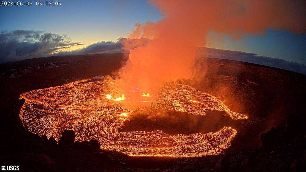 In this webcam image provided by the U.S. Geological Survey, an eruption takes place on the sum ...