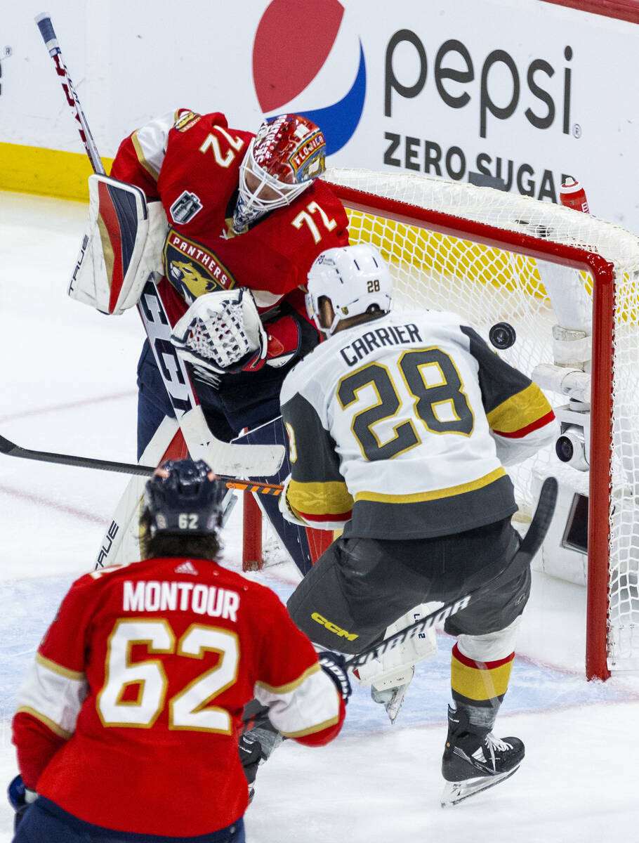 Florida Panthers goaltender Sergei Bobrovsky (72) deflects a shot with Golden Knights left wing ...