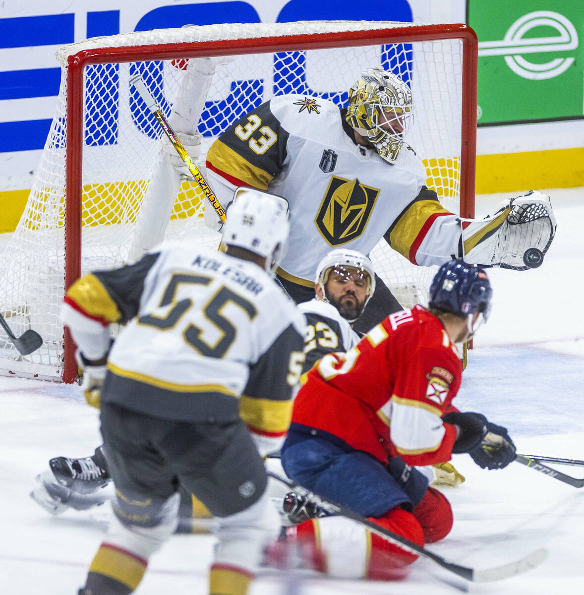 Golden Knights goaltender Adin Hill (33) makes another save against Florida Panthers defenseman ...