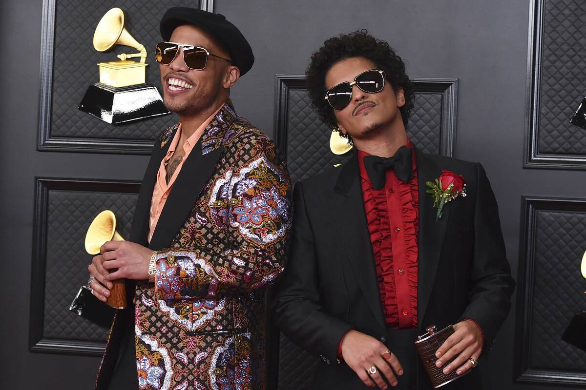 Anderson .Paak, left, and Bruno Mars, of the duo Silk Sonic, appear at the 63rd annual Grammy A ...