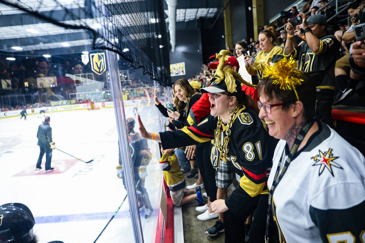 Fans cheer the Golden Knights at practice ahead of home game 5 of the Stanley Cup Finals agains ...