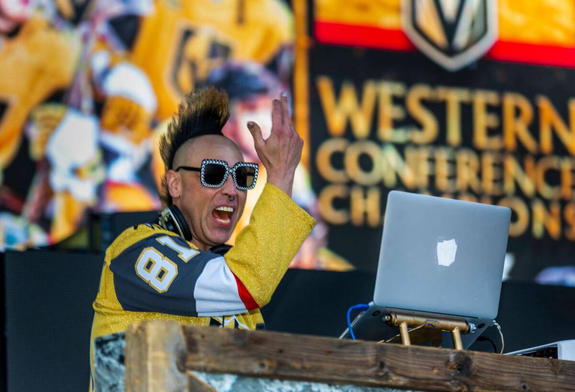 Golden Knights DJ Michael Toast gets the fans pumped up outside before Game 5 of the NHL hockey ...