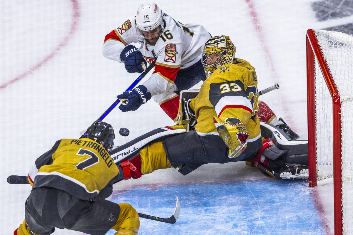 Golden Knights goaltender Adin Hill (33) saves a goal attempt by Florida Panthers center Aleksa ...