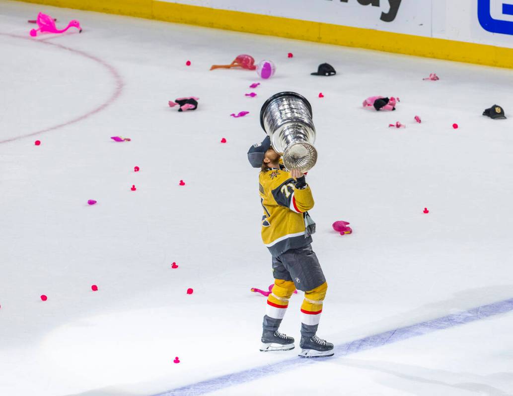 Golden Knights center William Karlsson (71) kisses the Stanley Cup after their 9-3 win over the ...