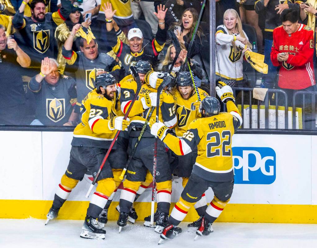 Golden Knights center William Karlsson (71) and teammates celebrate a goal against Florida Pant ...