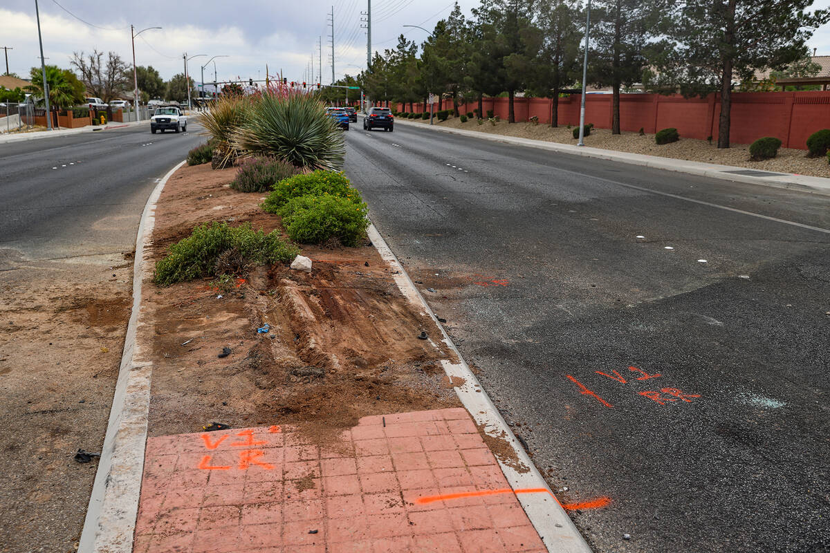 The scene where three people died in a fiery crash involving a stolen car at Carey Avenue and W ...