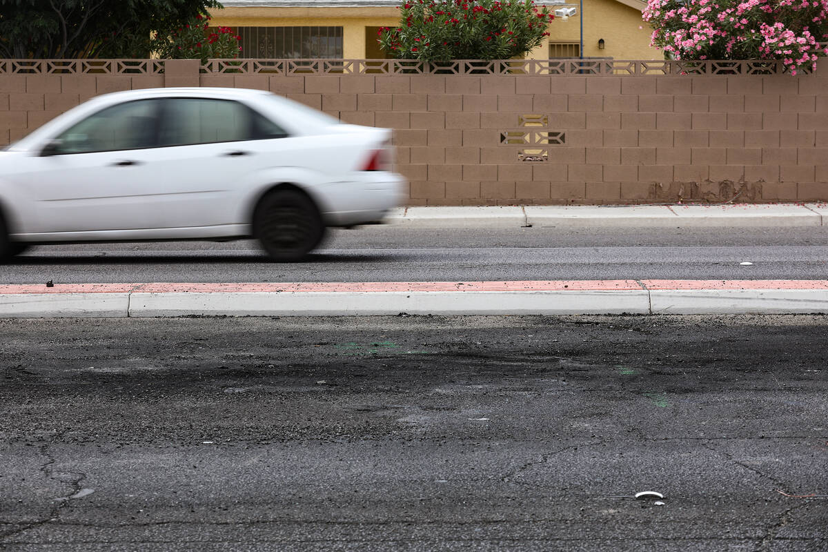 The scene where three people died in a fiery crash involving a stolen car at Carey Avenue and W ...