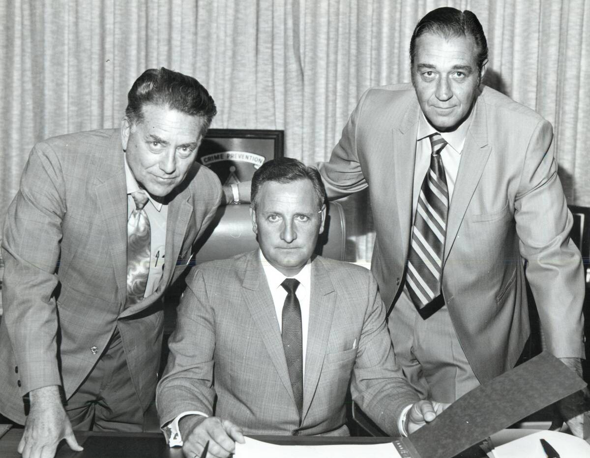 Clark County Sheriff Ralph Lamb, center, poses with the former Chief of Las Vegas police, John ...