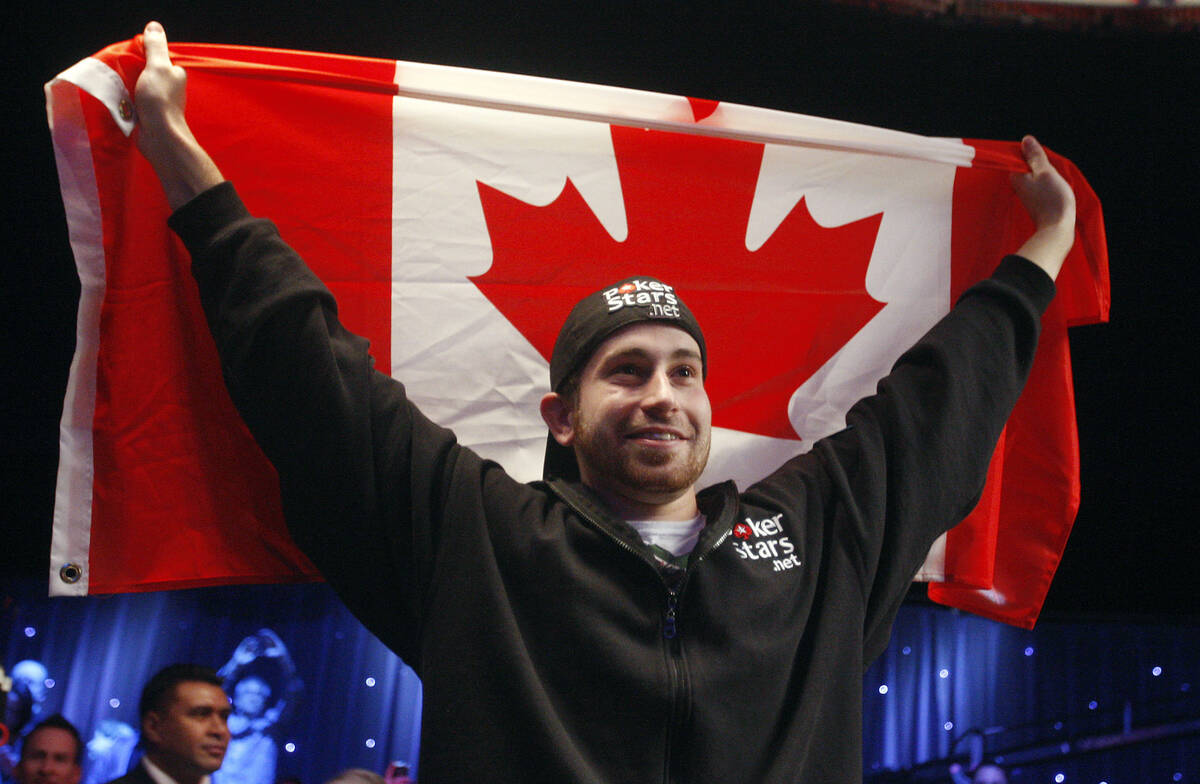 Jonathan Duhamel celebrates winning the World Series of Poker, Monday, Nov. 8, 2010 in Las Vega ...