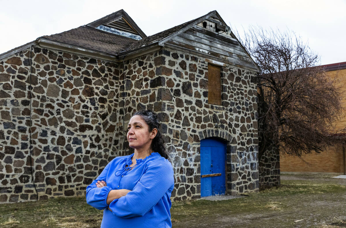 Owyhee Combined School Assistant Principal Lynn Manning John stands outside the old gym within ...